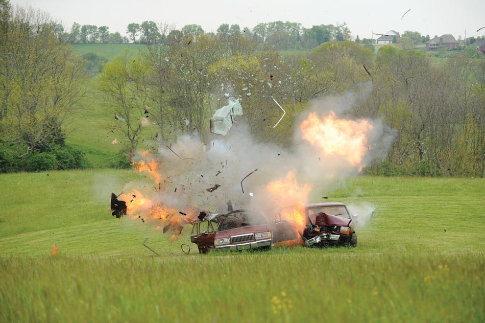 A training shot scatters debris from two vehicles for a post-explosion investigation course at Eastern Kentucky University&apos;s Fire, Arson and Explosion Investigation degree program.