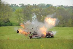 A training shot scatters debris from two vehicles for a post-explosion investigation course at Eastern Kentucky University's Fire, Arson and Explosion Investigation degree program. A training shot scatters debris from two vehicles for a post-explosion investigation course at Eastern Kentucky University's Fire, Arson and Explosion Investigation degree program.