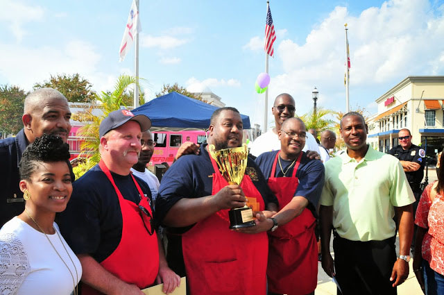 Team PGFD proudly displays its winning trophy.