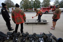 Part of St. Paul's physical agility exam includes the Kasier sled, which simulates chopping actions. Part of St. Paul's physical agility exam includes the Kasier sled, which simulates chopping actions.