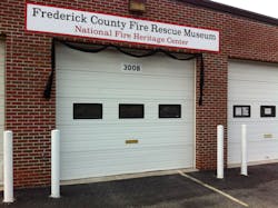 Black bunting hangs from the National Fire Heritage Center to honor a founder, Robbie Robertson. Black bunting hangs from the National Fire Heritage Center to honor a founder, Robbie Robertson.