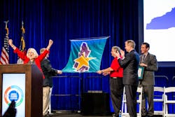 Commissioner Berry celebrates with Scott Safety executives as the Carolina Star flag is raised at the company's Monroe, North Carolina facility. The award recognizes company's with exemplary safety and health programs in the workplace. Commissioner Berry celebrates with Scott Safety executives as the Carolina Star flag is raised at the company's Monroe, North Carolina facility. The award recognizes company's with exemplary safety and health programs in the workplace.