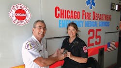 Chicago Fire Department Deputy District Chief Robert Anthony presents Paramedic Anne Gradolf with a dedicated meter for detecting carbon monoxide (CO) gas. Last year, Gradolf&apos;s &apos;gut instincts&apos; saved the lives of 10 people suffering from CO poisoning in a home in city&apos;s southeast side.