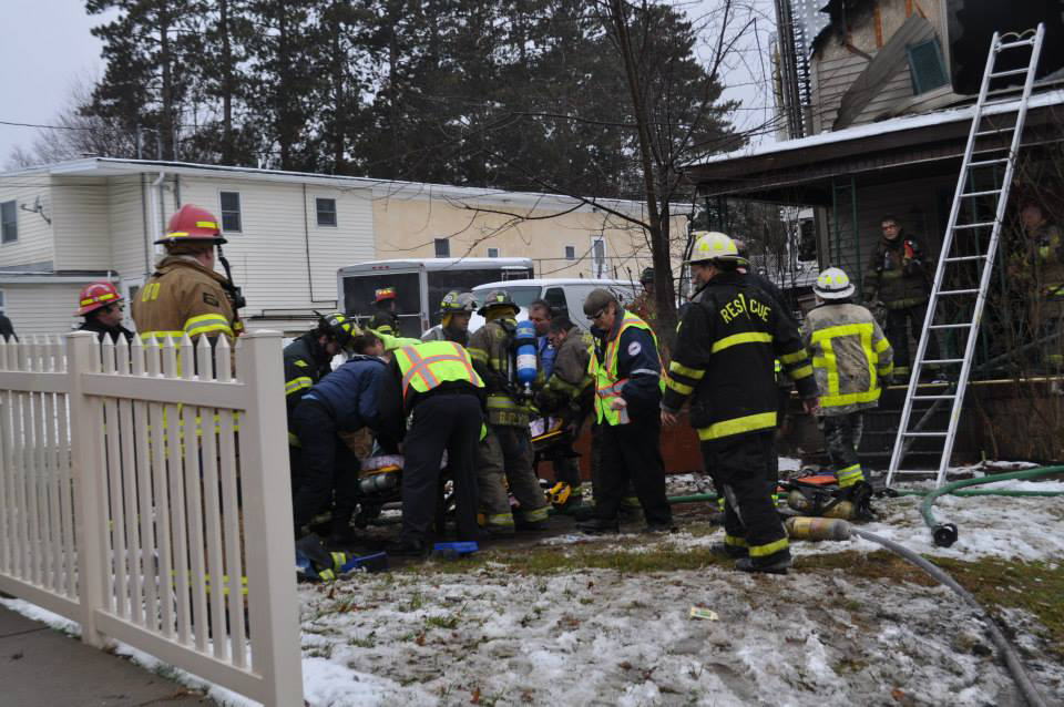 One of the injured firefighters is attended to after the ceiling collapse Monday. See more scene photos in the photo gallery below.