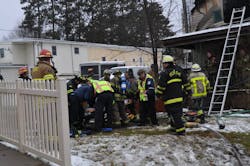 One of the injured firefighters is attended to after the ceiling collapse Monday. See more scene photos in the photo gallery below. One of the injured firefighters is attended to after the ceiling collapse Monday. See more scene photos in the photo gallery below.