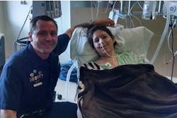Denver Police Officer Dwayne Huddleston visits Alexis Davis.