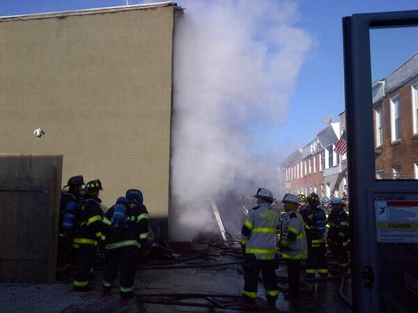 Baltimore crews battling flames, cold Tuesday afternoon.