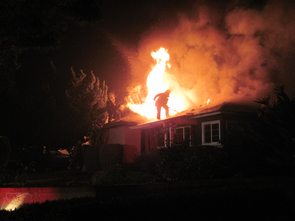 Fullerton, Calif. - Pastor Fernando Villica&ntilde;a captured what appears to be firefighter-shaped flame as crews ventilated a dwelling fire. See more.