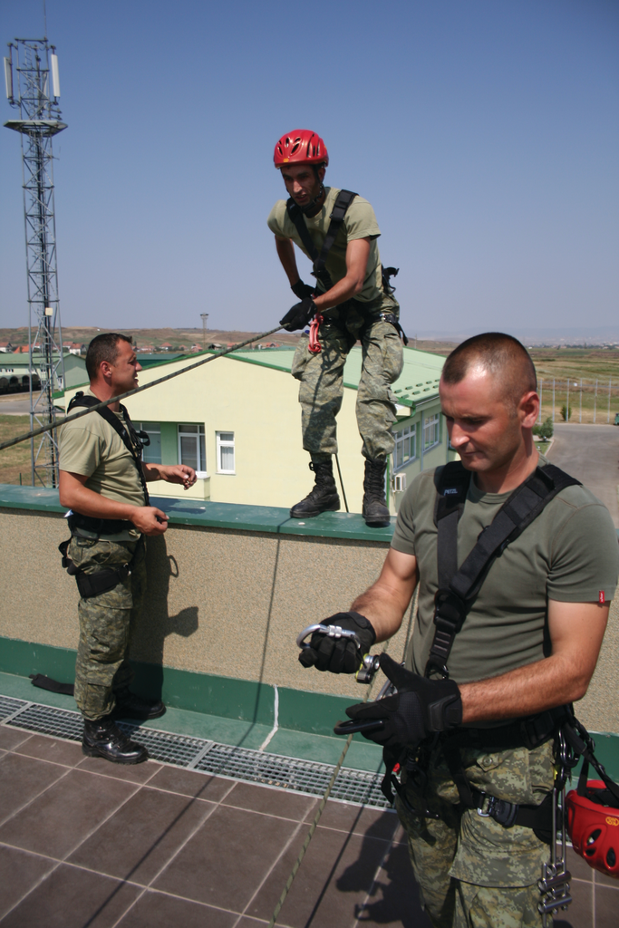 The Kosovo rescue instructors, all war veterans, include, from left, Samir Ismailj, Sabri Sada and Valdrim Kelmendi.