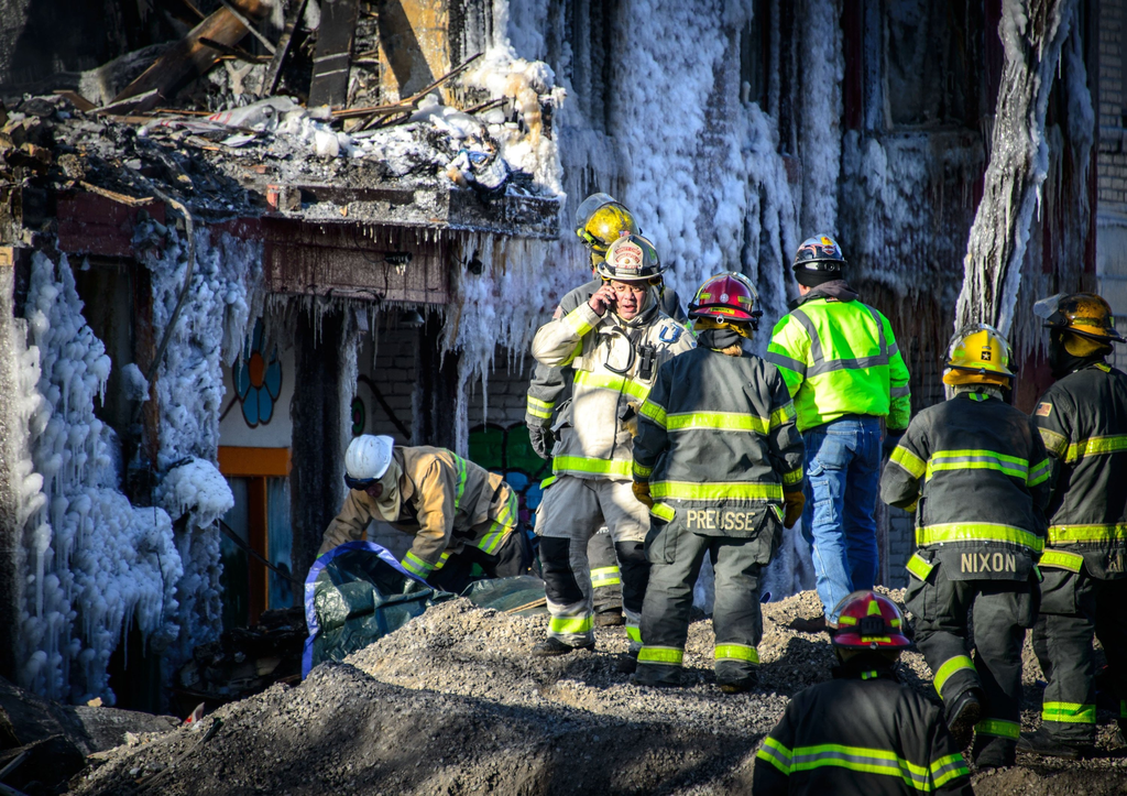 Minneapolis firefighters spent Thursday looking for victims in the rubble.