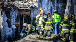 Minneapolis firefighters spent Thursday looking for victims in the rubble.