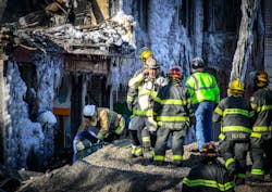 Minneapolis firefighters spent Thursday looking for victims in the rubble. Minneapolis firefighters spent Thursday looking for victims in the rubble.