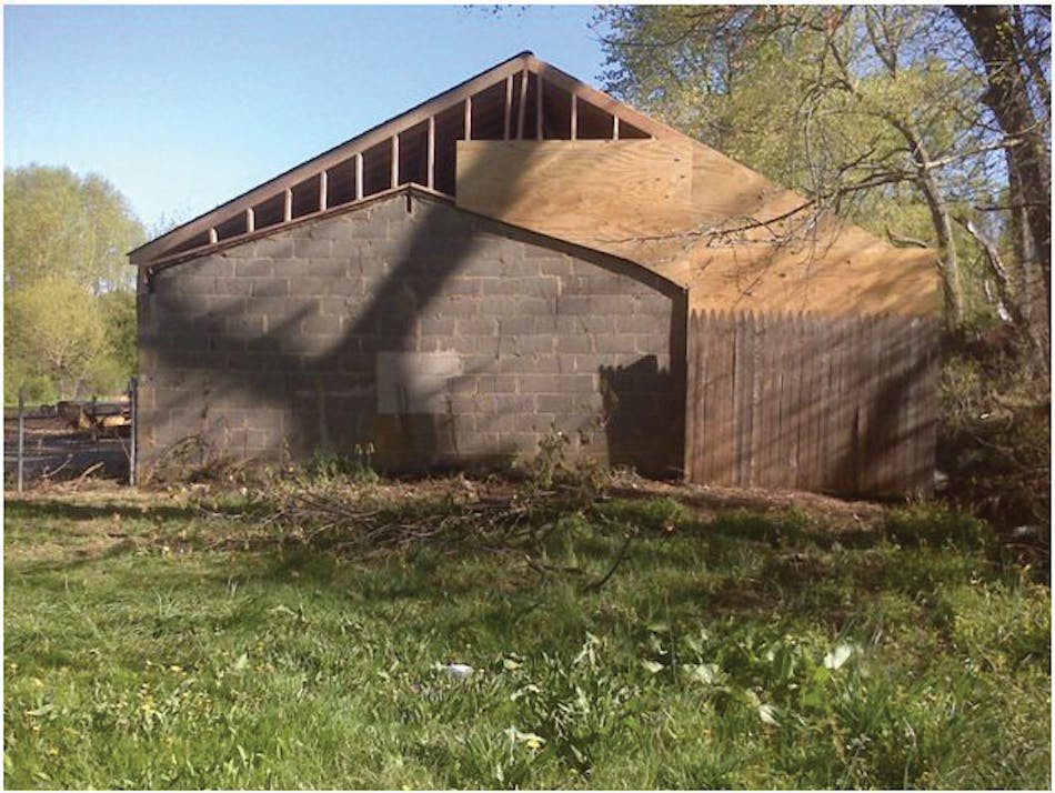 Photo 4. The same garage in the last photograph was a concrete block building with a wood frame addition.