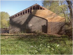 Photo 4. The same garage in the last photograph was a concrete block building with a wood frame addition. Photo 4. The same garage in the last photograph was a concrete block building with a wood frame addition.