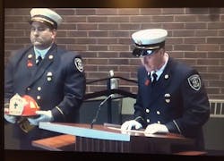 Penfield Fire Chief Christopher Ebmyer honors Tyler at his funeral. Penfield Fire Chief Christopher Ebmyer honors Tyler at his funeral.