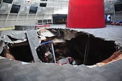 Eight cars were damaged by this sinkhole. Eight cars were damaged by this sinkhole.