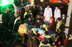 Korean responders aid victims of collapse. Korean responders aid victims of collapse.