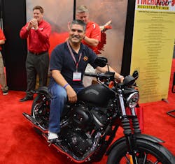 Art Jimenez, a firefighter with the Los Angeles County Fire Department, won the Firehouse World Harley-Davidson giveaway in San Diego.