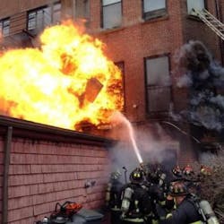 Firefighters hit flames in Boston.
