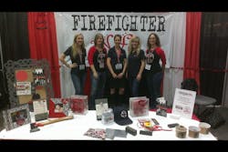 The Firefighter Wife volunteers posed for a quick group photo in their booth at Firehouse World in San Diego last month. The Firefighter Wife volunteers posed for a quick group photo in their booth at Firehouse World in San Diego last month.
