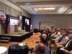 Atlanta Fire Chief Kelvin Cochran talks with the crowd in Tampa.