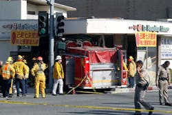 Firefighters and other officials work the scene of an accident where two firetrucks answering a call collided en route to a fire Wednesday, April 16, 2014, in Monterrey Park, Calif. The collision sent one firetruck careening into a restaurant, leaving 14 people, including several firefighters, injured. Firefighters and other officials work the scene of an accident where two firetrucks answering a call collided en route to a fire Wednesday, April 16, 2014, in Monterrey Park, Calif. The collision sent one firetruck careening into a restaurant, leaving 14 people, including several firefighters, injured.