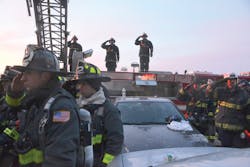 Firefighters salute as the body of Boston Fire Department Lieutenant Edward J. Walsh is removed from the structure in which he and Firefighter Michael R. Kennedy were killed on March 26, 2014. See page 48. Firefighters salute as the body of Boston Fire Department Lieutenant Edward J. Walsh is removed from the structure in which he and Firefighter Michael R. Kennedy were killed on March 26, 2014. See page 48.