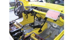 The horizontal dash support pipe (yellow) and the two dash tie downs (black) are shown in this vehicle display. With the instrument panel, dash, and all normal components in place, these items are all hidden from sight.