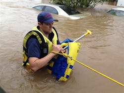 Rusty Murphy makes his way through high water in an Alabama mobile home park. Rusty Murphy makes his way through high water in an Alabama mobile home park.