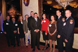 FDNY firefighter Robert Wiedmann (center) with nine of the blood donors who saved his life at New York Blood Center's annual Long Island donor recognition awards dinner. FDNY firefighter Robert Wiedmann (center) with nine of the blood donors who saved his life at New York Blood Center's annual Long Island donor recognition awards dinner.