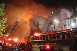 UNION CITY, NJ, MAY 6, 2014 &ndash; An early-morning fire started in a grocery store in a three-story wood-frame building. First-in units found heavy fire through openings in roll-down security gates in front of the store. The fire quickly rose up the voids in the original building and extended to a row of five attached 2-1/2-story occupied dwellings. Smoke was showing from the cockloft of two of the dwellings when the first-alarm units arrived. Approximately 40 residents were displaced. More than 100 firefighters from the North Hudson Regional Fire Department operated at the scene along with mutual aid units from Jersey City. One firefighter suffered a minor injury.