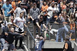 Rob Winner, a captain with San Rafael Fire, caught the home run ball during Sunday&apos;s Rockies and Giants game.