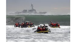 U.S. Navy SEAL students participate in Surf Passage at Naval Amphibious Base Coronado.