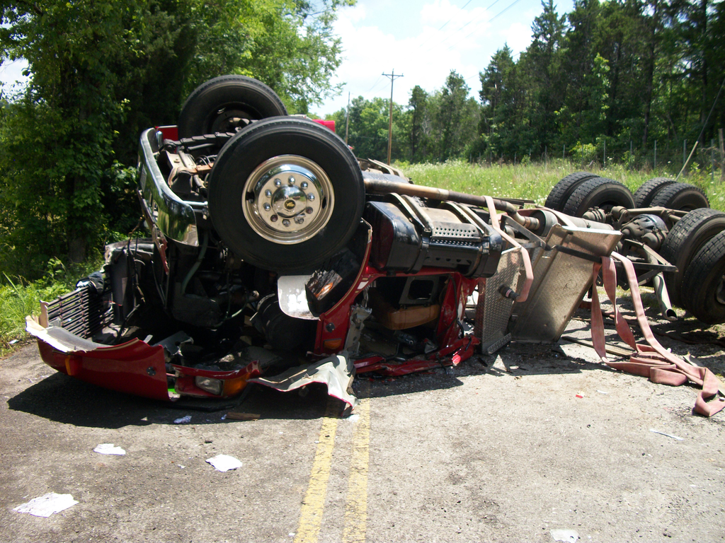 The Kittrell Volunteer Fire Department's tanker was near the structure fire when it rolled over.