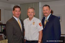 (From left) Boston Mayor Marty Walsh, Acting Fire Commissioner John Hasson and newly appointed Fire Commissioner/Chief of Department Joseph Finn