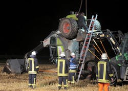 In this picture taken late Tuesday, July 29, 2014, firefighters try to set up a mechanical digger on a field near Isselburg, western Germany. German authorities say a man was killed and several others were injured when the digger tipped over and hit them during a so-called Cod Water Challenge. In this picture taken late Tuesday, July 29, 2014, firefighters try to set up a mechanical digger on a field near Isselburg, western Germany. German authorities say a man was killed and several others were injured when the digger tipped over and hit them during a so-called Cod Water Challenge.