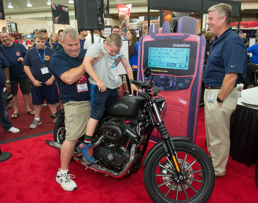 Frank Hrbek Jr., from Elmont, N.Y., won the Harley-Davidson giveaway from Unification at Firehouse Expo in Baltimore.