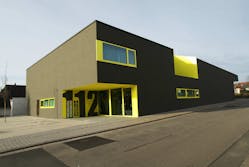Russelsheim, Germany&apos;s fire station is as simple as a shoe box, but uses cut outs and contrasting colors to give it some architectural appeal.