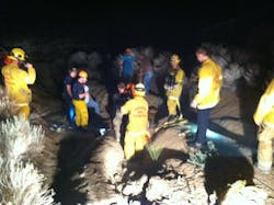 Crews from San Bernardino County Fire Department work to rescue the horse. Crews from San Bernardino County Fire Department work to rescue the horse.