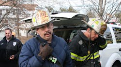 Firehouse Editor Emeritus Harvey Eisner (left) works a fire scene with blogger Robert Moran in the early 2000&apos;s.