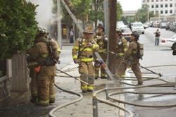 Photo 1. Chief and company officers must ensure coordination between engine and ladder companies. Photo 1. Chief and company officers must ensure coordination between engine and ladder companies.