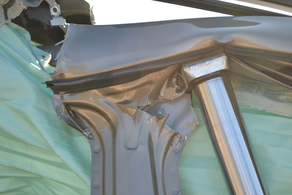 As the power ram creates stress in the upper structure of the vehicle, the metal will tear and separate. With enough force applied in the right location, the entire top of the B-pillar can be separated from the roof rail without any cutting accomplished. At that point, the pillar can be forced down and outward to provide access to the interior.