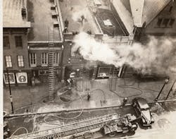 Firefighters from Baltimore City, MD, Fire Department Truck Company 2 operate on South Eutaw Street on Feb. 2, 1939. Firefighters from Baltimore City, MD, Fire Department Truck Company 2 operate on South Eutaw Street on Feb. 2, 1939.