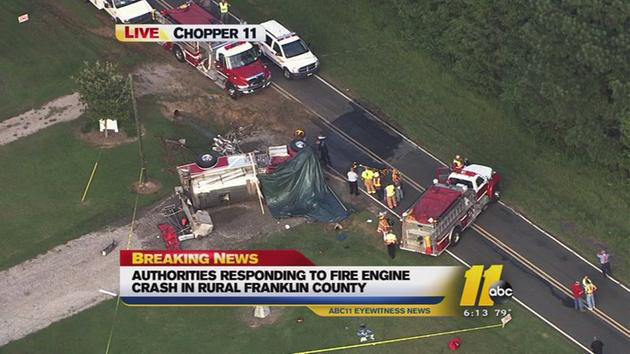A Justice firefighter was killed when a tanker truck rolled over enroute to a fire in Franklin County.