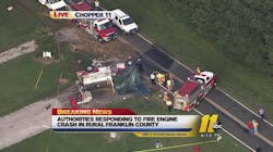 A Justice firefighter was killed when a tanker truck rolled over enroute to a fire in Franklin County.