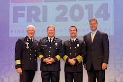 Pictured from left to right: Fire Chief Bill Metcalf (IAFC President), 2014 Career Fire Chief Honoree Alan J. Martin, 2014 Volunteer Fire Chief Honoree Chris Barron and Jim Johnson, Oshkosh Corporation executive vice president and president, Fire & Emergency. Pictured from left to right: Fire Chief Bill Metcalf (IAFC President), 2014 Career Fire Chief Honoree Alan J. Martin, 2014 Volunteer Fire Chief Honoree Chris Barron and Jim Johnson, Oshkosh Corporation executive vice president and president, Fire & Emergency.