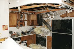 Show this photo of damage from a stove fire to members of the public. Cooking fires are usually caused by grease or food that catches fire, faulty cooking equipment or combustible items placed too close to the stove.