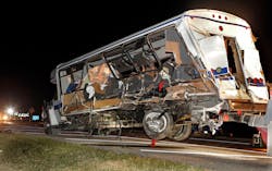 A wrecker removes the team bus as Highway Patrol and emergency personnel work the scene of a fatality accident just south of the Turner Falls area.on Saturday, Sept. 27, 2014 in Davis, Okla. Four members of a Texas college softball team died after a tractor trailer crossed over the center median on Interstate 35 and collided with the team's bus Friday night. A wrecker removes the team bus as Highway Patrol and emergency personnel work the scene of a fatality accident just south of the Turner Falls area.on Saturday, Sept. 27, 2014 in Davis, Okla. Four members of a Texas college softball team died after a tractor trailer crossed over the center median on Interstate 35 and collided with the team's bus Friday night.