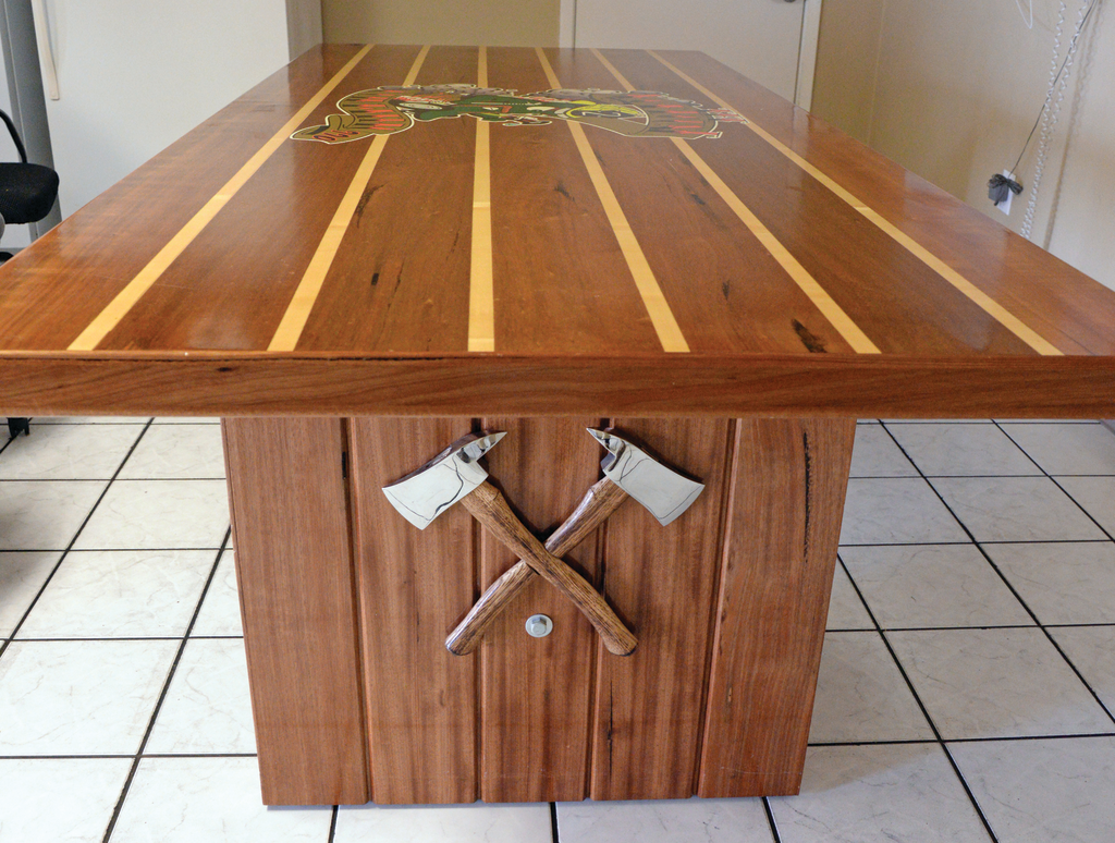 Doors were used as the table tops and legs for Station 2&rsquo;s dining table, axes crossed on the sides and a ladder underneath.
