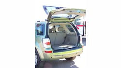 The Mercury Mariner SUV has two lifter struts to assist in opening the heavy liftgate. Note that the rear window glass is hinged and has its own set of smaller lifter struts. These small struts can extend outward when the rear window is broken.